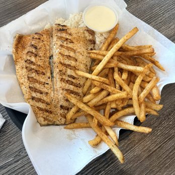 Fish Daddy Grill - Rainbow Trout with garlic butter, and Cajun fries - Seafood Near Me - Fullerton, California Fish Daddy Grill - Rainbow Trout with garlic butter, and Cajun fries - Seafood Near Me - Fullerton, California
