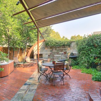 Sac Metro Homes - a patio with a table and chairs - General Contractors Near Me - Sacramento, California Sac Metro Homes - a patio with a table and chairs - General Contractors Near Me - Sacramento, California