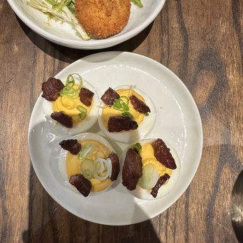 S.K.Y. - Sambal Deviled Eggs (Crispy Croquettes peek-a-booing in the corner) - New American Near Me - Chicago, Illinois S.K.Y. - Sambal Deviled Eggs (Crispy Croquettes peek-a-booing in the corner) - New American Near Me - Chicago, Illinois