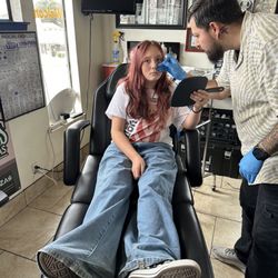Deep Blue Tattoo - Nose piercing