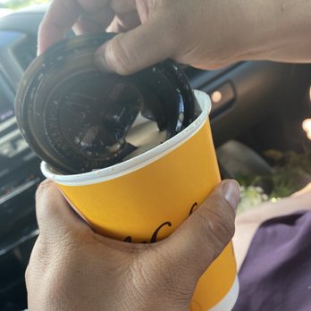 McDonald's - a person holding a cup of coffee - Fast Food Near Me - Dunkirk, Maryland McDonald's - a person holding a cup of coffee - Fast Food Near Me - Dunkirk, Maryland
