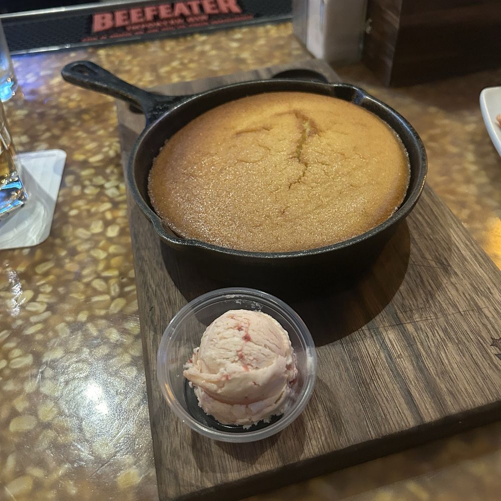 Complimentary cornbread with strawberry butter Complimentary cornbread with strawberry butter