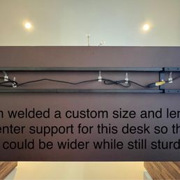 Bottom of sit-stand desk with custom center support welded by Ron. Bottom of sit-stand desk with custom center support welded by Ron.