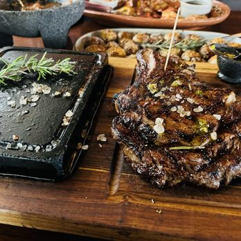 Sonora Steak - 18oz Ribeye cooked Medium on a stone. - Steakhouses Near Me - Maple Valley, Washington