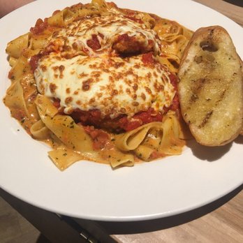 Turtle Jack's - Chicken Parmesan with Pappardelle pasta and garlic bread - Sports Bars Near Me - Etobicoke, Ontario