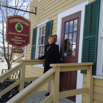 Cooperstown Chamber of Commerce - Executive Director, Patricia Szarpa, in front of the Chamber. - Public Services & Government Near Me - Cooperstown, New York Cooperstown Chamber of Commerce - Executive Director, Patricia Szarpa, in front of the Chamber. - Public Services & Government Near Me - Cooperstown, New York