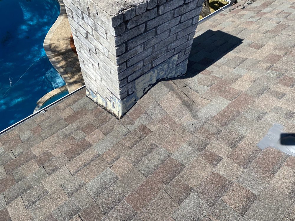 Slide of Texan Roofing Pro