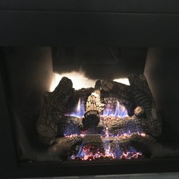 discolored black fireplace backing... discolored black fireplace backing...