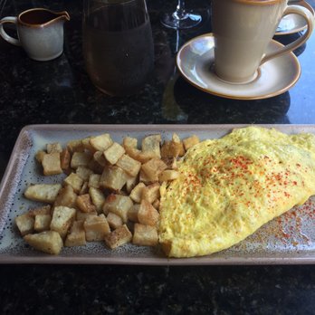Curio Bistro - Omelette with crawfish and mushrooms. - Cajun/Creole Near Me - New Orleans, Louisiana Curio Bistro - Omelette with crawfish and mushrooms. - Cajun/Creole Near Me - New Orleans, Louisiana