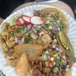 One each, asada, pollo de asada, and pastor. Very good.