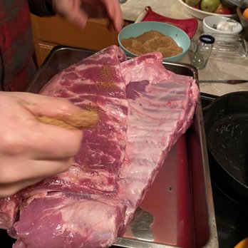 Lowery Meat & Grocery - a person preparing a steak - Grocery Near Me - Buchanan, Michigan