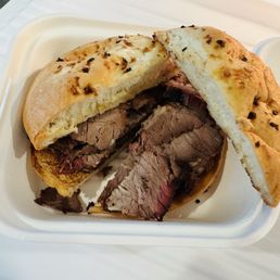 Lol The "brisket sandwich" - a handful of unbelievably DRY meat slapped between a dry onion bun. For $14?!