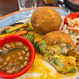 Deep fried avocado with chicken and charro beans