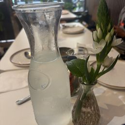 Clean water and have a nice flower on the table Clean water and have a nice flower on the table