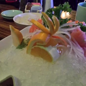 Sushi Yama - Beautiful orange garnish on sashimi appetizer. - Japanese Near Me - Boca Raton, Florida Sushi Yama - Beautiful orange garnish on sashimi appetizer. - Japanese Near Me - Boca Raton, Florida