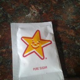 Sugar packet on table clean friendly attentive little slow