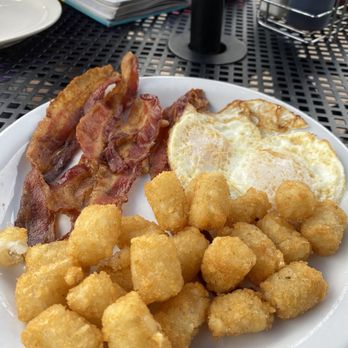 Aloha Stacks - Tater tots, egg and bacon. Tots are a little overly salted but good protein dish - Pancakes Near Me - Cerritos, California Aloha Stacks - Tater tots, egg and bacon. Tots are a little overly salted but good protein dish - Pancakes Near Me - Cerritos, California