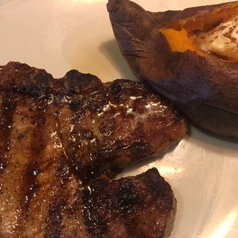 Outback Steakhouse - Pork chops with sweet potato as a side. Amazing! - Steakhouses Near Me - Frisco, Texas Outback Steakhouse - Pork chops with sweet potato as a side. Amazing! - Steakhouses Near Me - Frisco, Texas