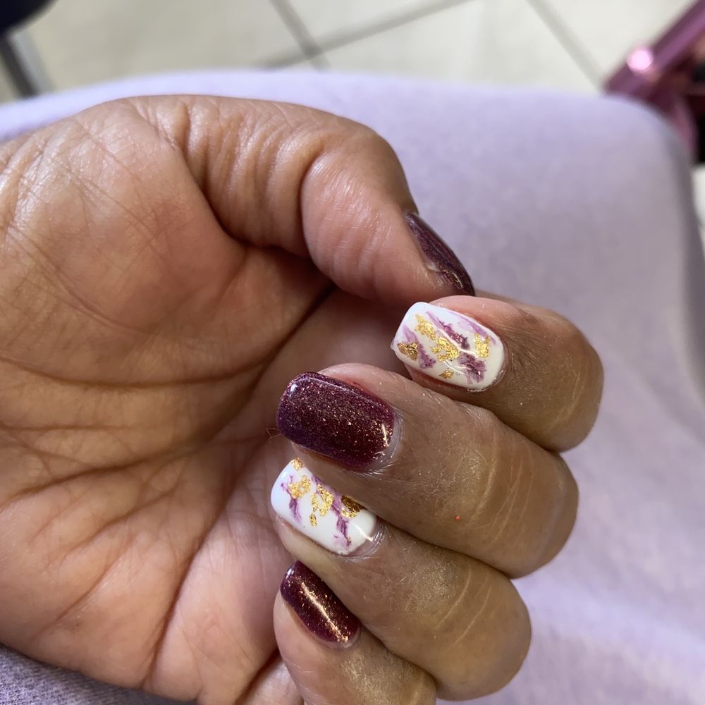 Smiley Nails - Gel ruby nails with white with dark red marbled swirls and gold flecks. It came with a massage! - Nail Salons Near Me - Honolulu, Hawaii Smiley Nails - Gel ruby nails with white with dark red marbled swirls and gold flecks. It came with a massage! - Nail Salons Near Me - Honolulu, Hawaii