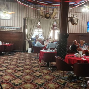 Irma Hotel - Lounge area, I would imagine for special events. The main dining area looks much the same but with old photos around the room. - Hotels Near Me - Cody, Wyoming Irma Hotel - Lounge area, I would imagine for special events. The main dining area looks much the same but with old photos around the room. - Hotels Near Me - Cody, Wyoming