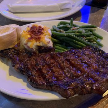 DBC Bar & Grill - 14 oz ribeye loaded potato and green beans $22. - Bars Near Me - Metairie, Louisiana