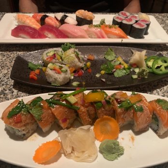 Sushi Den - Bottom to top: new salmon roll, tuna firecracker roll, and chef's choice sushi platter - Japanese Near Me - Denver, Colorado Sushi Den - Bottom to top: new salmon roll, tuna firecracker roll, and chef's choice sushi platter - Japanese Near Me - Denver, Colorado