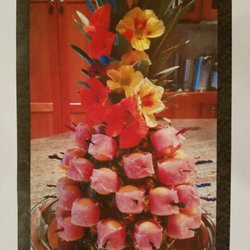 Le Petit Chef Caterers - Pineapple tree with melon and prosciutto balls