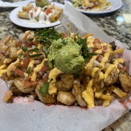 Surf N Turf  fries extra crispy with extra shrimp