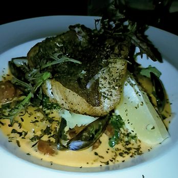 Richys Bar & Bistro - John dory in a mussel and chorizo sauce - Bars Near Me - Clonakilty, Colorado Richys Bar & Bistro - John dory in a mussel and chorizo sauce - Bars Near Me - Clonakilty, Colorado