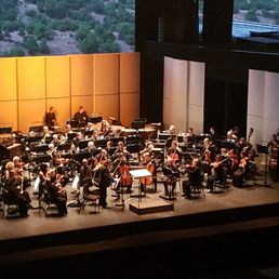 The operas symphony orchestra on stage for Miss Fleming's performance. The operas symphony orchestra on stage for Miss Fleming's performance.