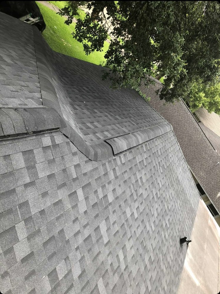 Slide of Reality Roofing