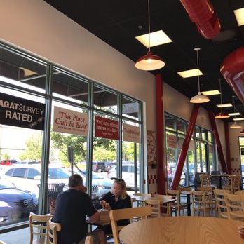 Five Guys - the inside of a fast food restaurant - Burgers Near Me - Orem, Utah