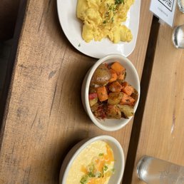 three plates of food on a table
