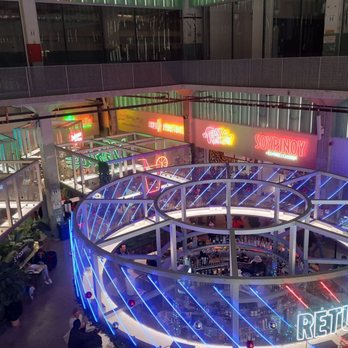 POST Houston - Winding Staircase view looking down at food hall. - Music Venues Near Me - Houston, Texas POST Houston - Winding Staircase view looking down at food hall. - Music Venues Near Me - Houston, Texas