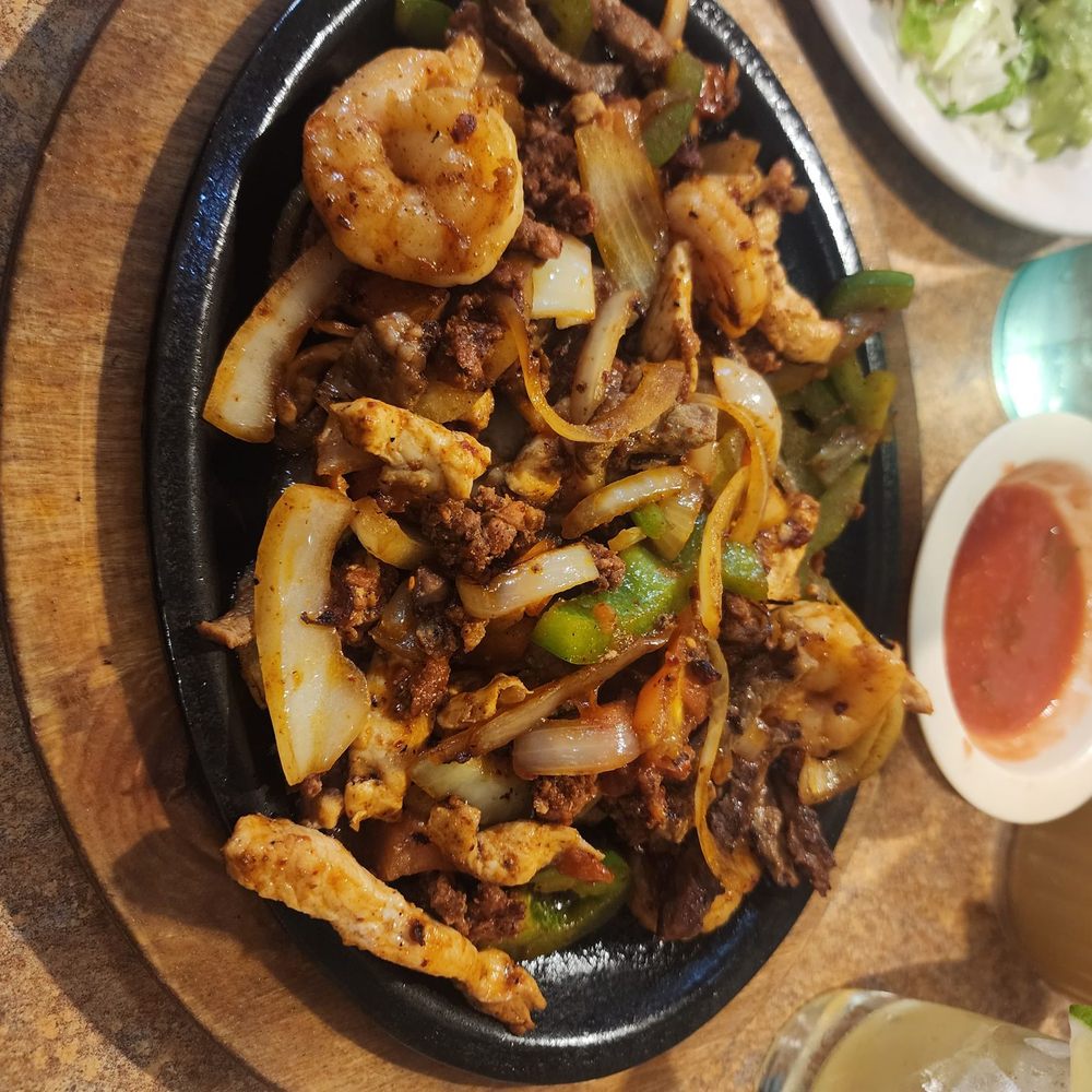 El Tio - Chicken, Shrimp, Steak, and Chorizo with onions and green peppers fajita - Mexican Near Me - Douglasville, Georgia El Tio - Chicken, Shrimp, Steak, and Chorizo with onions and green peppers fajita - Mexican Near Me - Douglasville, Georgia
