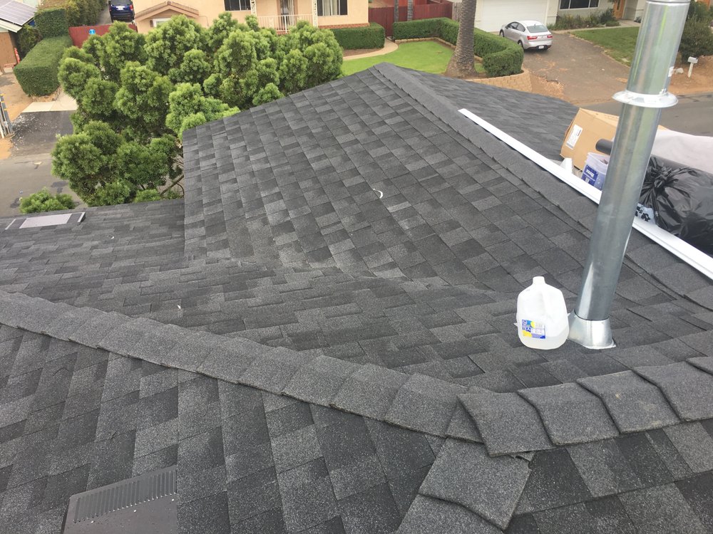 Slide of R Squared Roofing Services