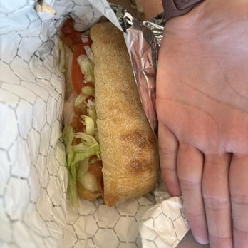 J T Bros - $19 sandwich vs female human hand - Sandwiches Near Me - San Diego, California J T Bros - $19 sandwich vs female human hand - Sandwiches Near Me - San Diego, California