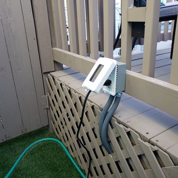 The Electric Company - Outlet installed on deck. - Electricians Near Me The Electric Company - Outlet installed on deck. - Electricians Near Me