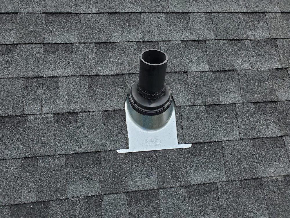 Slide of DOM Roofing & Restoration