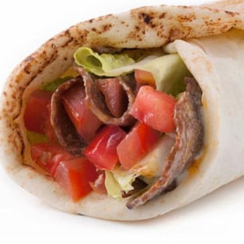Sammy's - a burrito with meat and vegetables - Pizza Near Me - Calgary, Alberta Sammy's - a burrito with meat and vegetables - Pizza Near Me - Calgary, Alberta