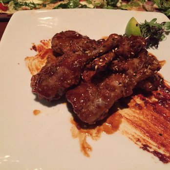 Seasons 52 - Duck wing lollipops - New American Near Me - Plano, Texas
