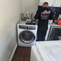 Quick & Pro Appliance Repair - Tech Edmon is replacing solenoid valve on stackable electrolux washer due to pitching noise