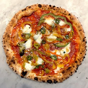 Punk Pizza - Red Hot Chili Peppers: Bell peppers, Carolina reaper, Trinidad Scorpion, Spanish peppers and mozzarella, salami and pecorino. - Pizza Near Me - Utrecht, Utah