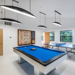 Stewart Mountain Lodging - Game room at Modern Treehouse will keep every entertained after a hard day of playing in the mountains.