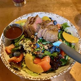 Dino steak salad with blueberry vinaigrette. Dino steak salad with blueberry vinaigrette.