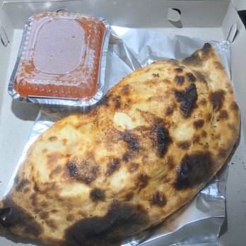 Olde World Apizza - Small seafood supreme calzone. - Pizza Near Me - North Haven, Connecticut