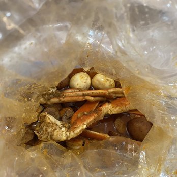 Mr. & Mrs. Crab - crab legs and eggs in a plastic bag - Seafood Near Me - Lakeland, Florida