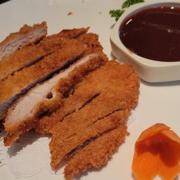 Pork cutlet and white rice. Presentation was spot on! Pork cutlet and white rice. Presentation was spot on!