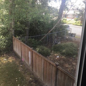 Aero Apartments - Backyard view of gate people have broken into leading into homeless community in backyard/ fence people like to urinate on - Apartments Near Me - Tacoma, Washington