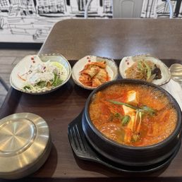 Kimchi Stew served with white rice, side salad, house made kimchi, and japchae Kimchi Stew served with white rice, side salad, house made kimchi, and japchae